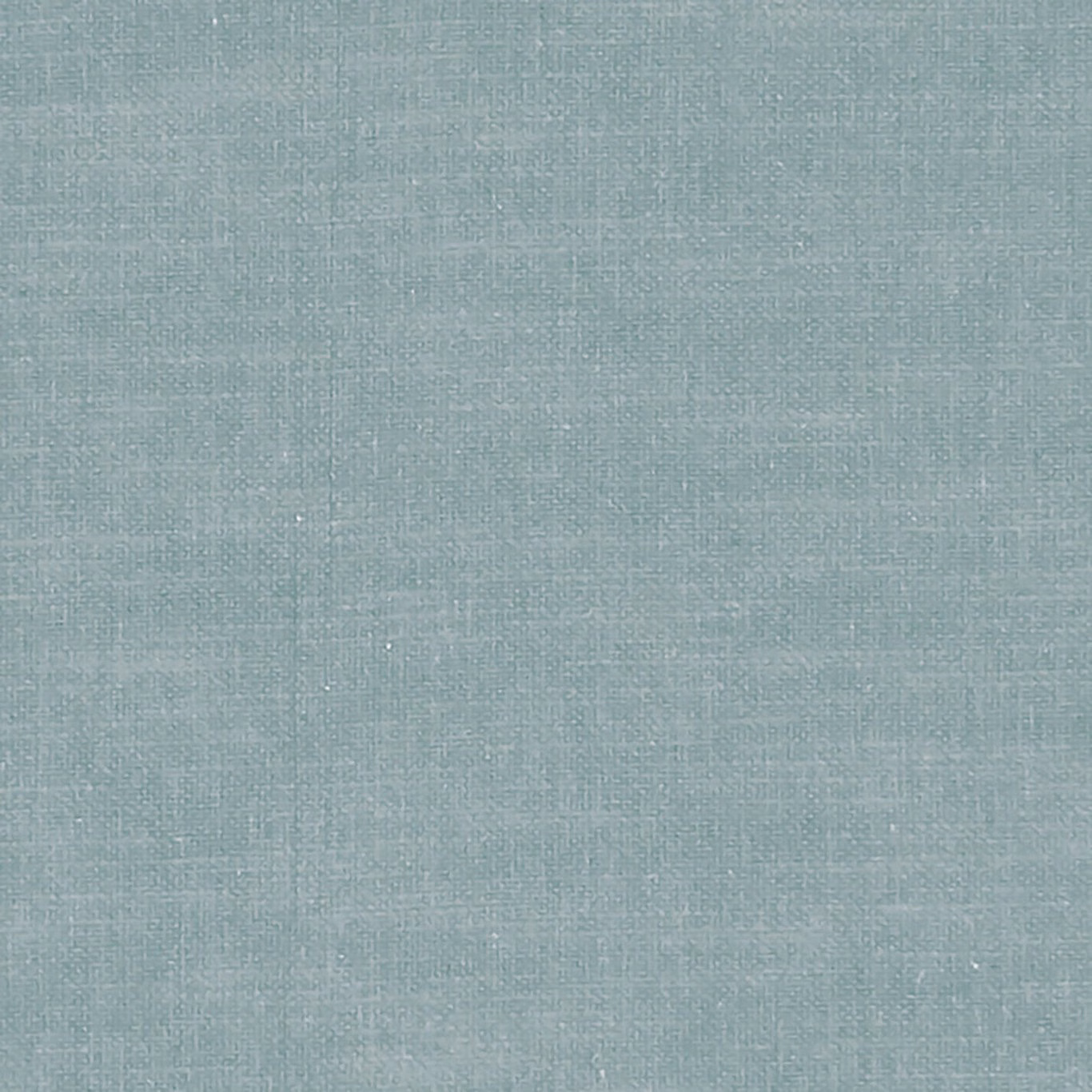 Close-up of cool denim-blue fabric with a fine crosshatched woven texture
