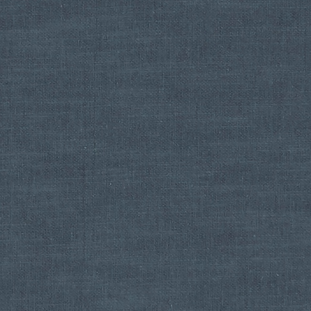 Close-up of deep midnight blue-teal fabric with a fine crosshatched woven texture
