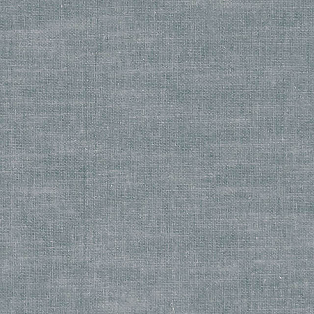 Close-up of cool blue-grey woven fabric with subtle crosshatched texture