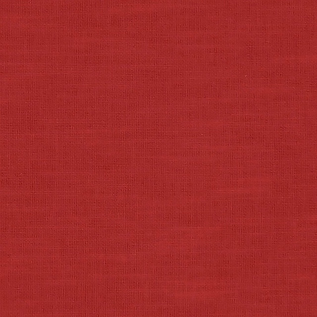 Close-up of Amalfi Rouge’s deep crimson plain weave with subtle crosshatch texture