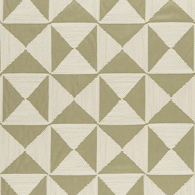 Muted willow olive fabric with raised ivory triangles in a tactile geometric weave