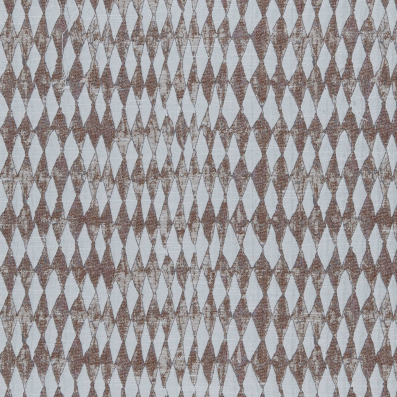 Dusty orchid and blue-grey woven diamonds with softly distressed texture