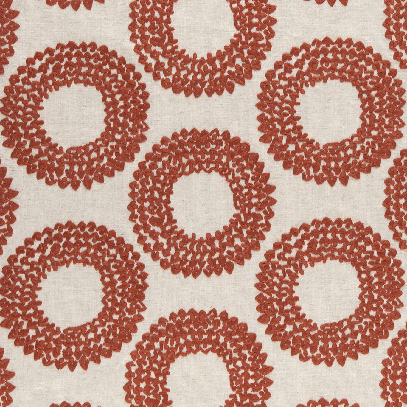 Ivory woven fabric with raised cinnabar-red interlocking ring motifs