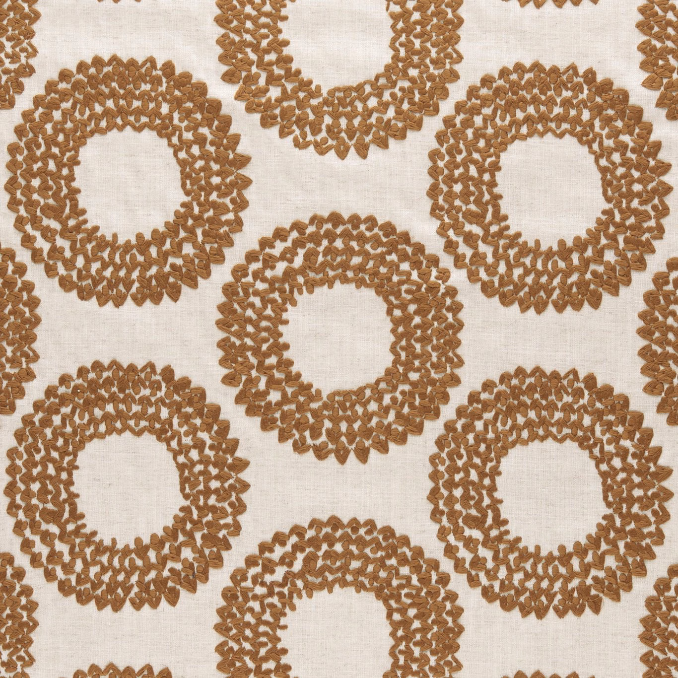 Ivory woven fabric with textured cinnamon-brown circular ring motifs