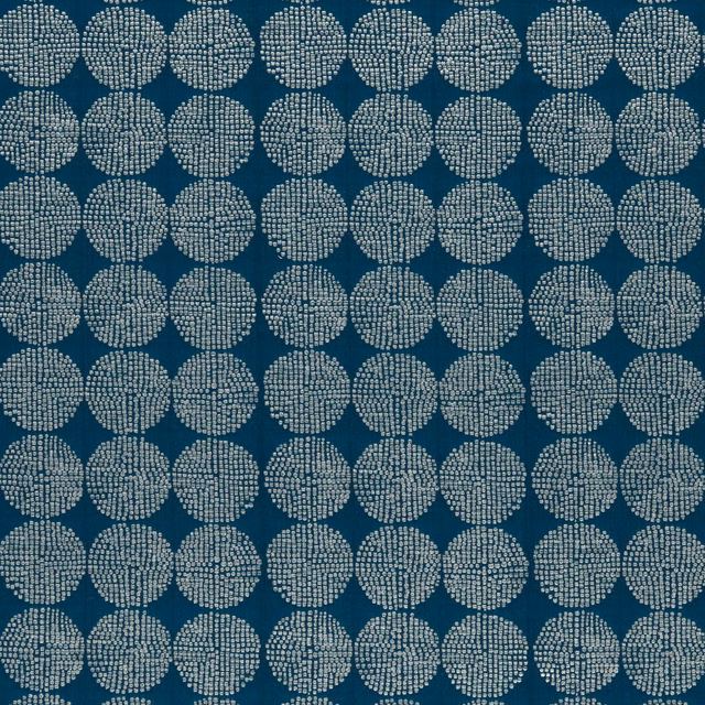 Deep aqua-teal fabric with pale dotted circular medallions in a regular woven repeat