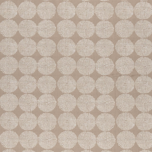 Warm beige woven ground with ivory dotted circular motifs in regular rows