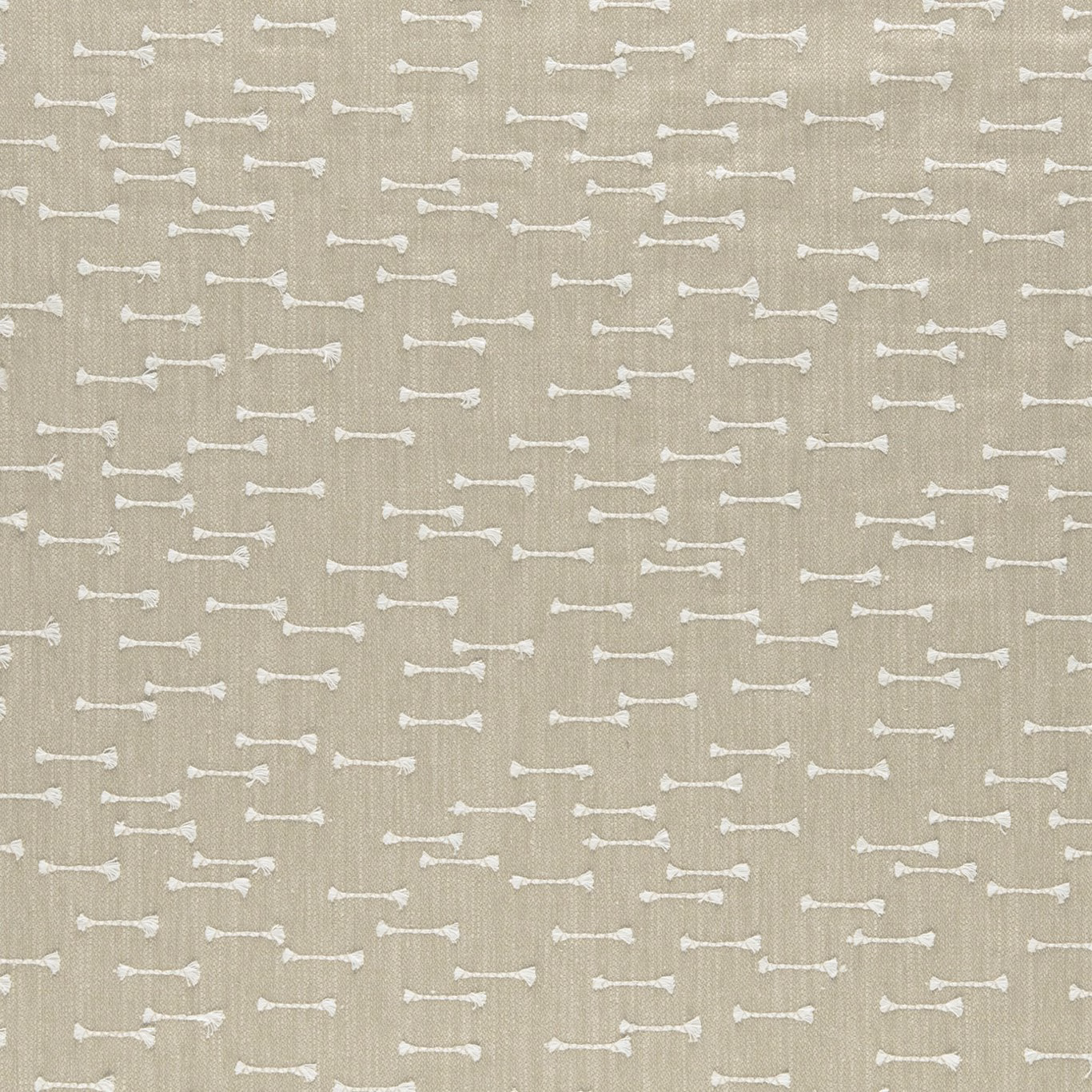 Warm beige woven fabric with small irregular ivory horizontal dash motifs