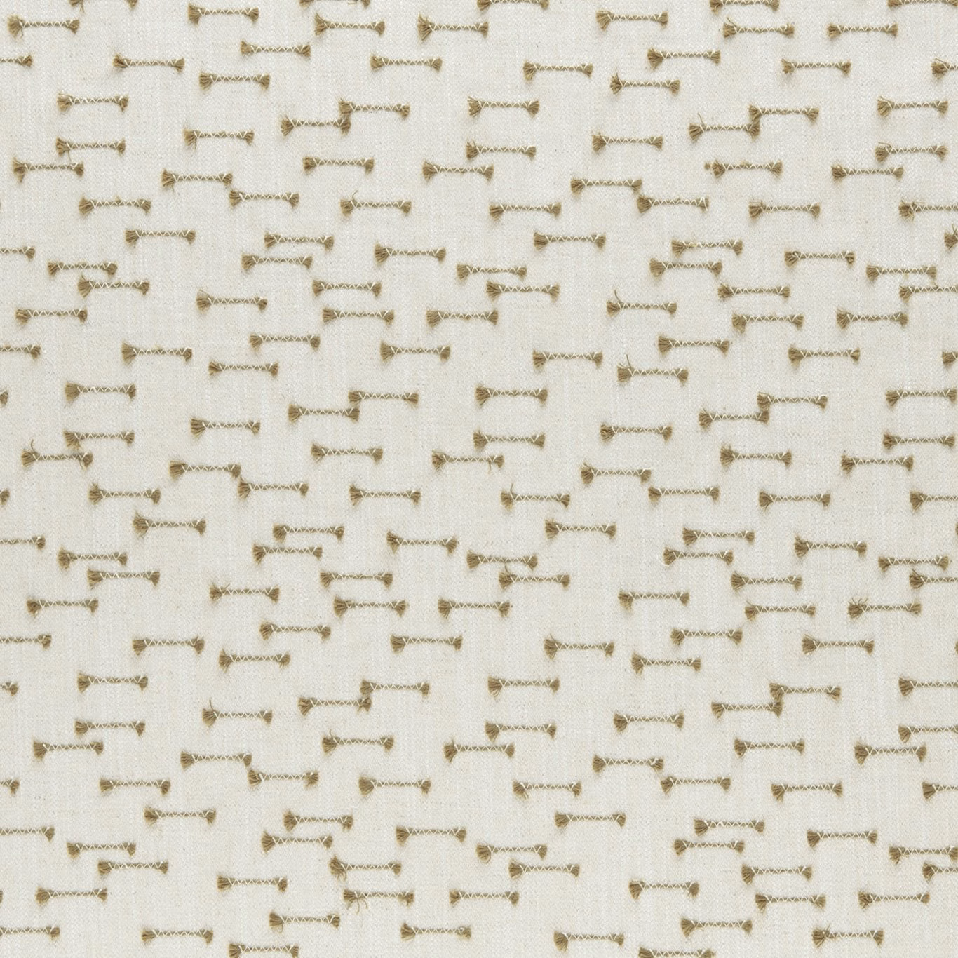 Warm ivory woven fabric with small willow-toned bow motifs and visible texture