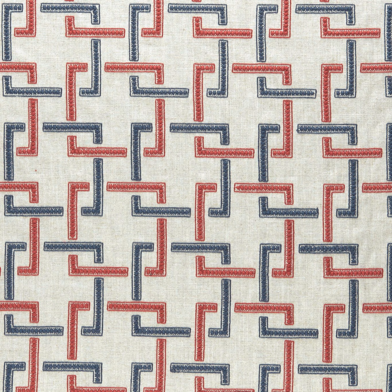 Cream woven fabric with repeating indigo and red angular geometric lines