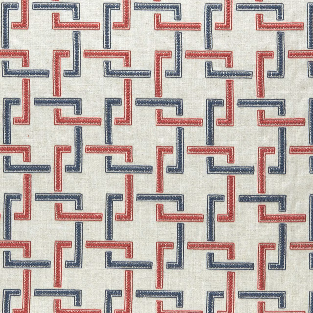 Cream woven fabric with repeating indigo and red angular geometric lines