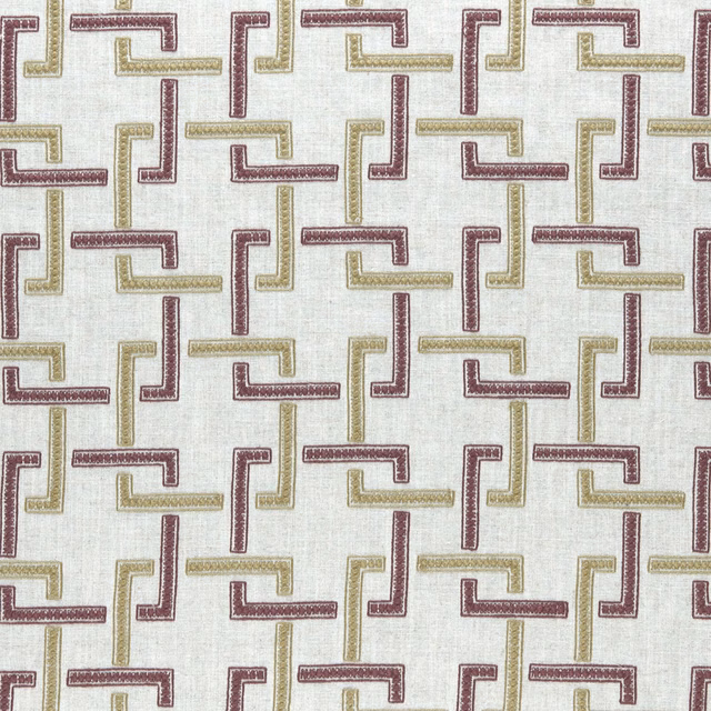 Ivory woven fabric with muted orchid and willow interlocking angular motifs