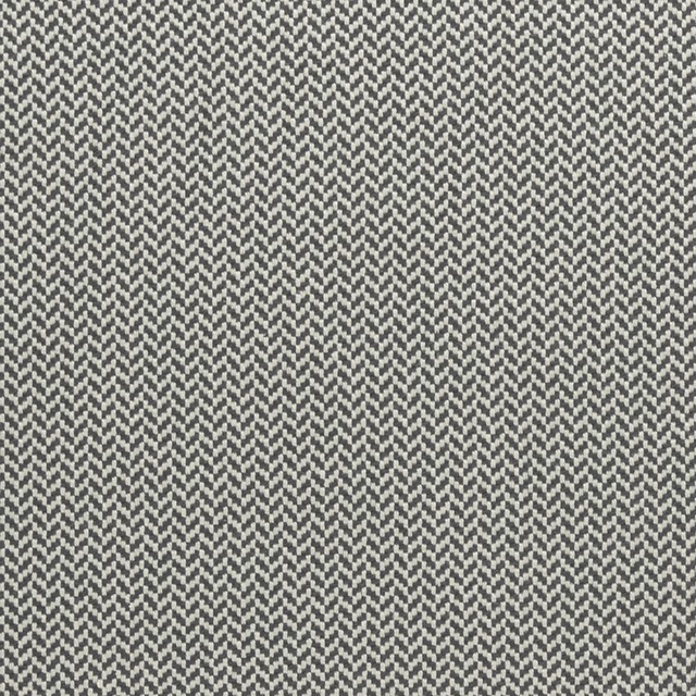 Dense charcoal and pale grey herringbone weave with a softly textured finish