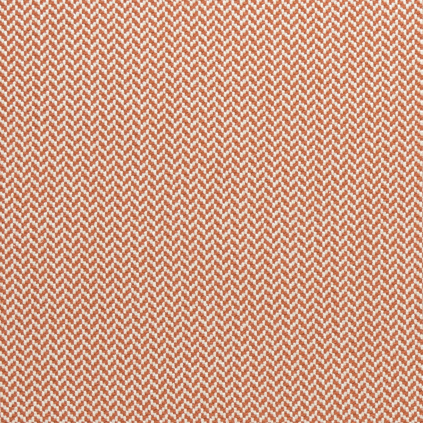 Close-up of warm cinnabar and cream zigzag woven upholstery fabric