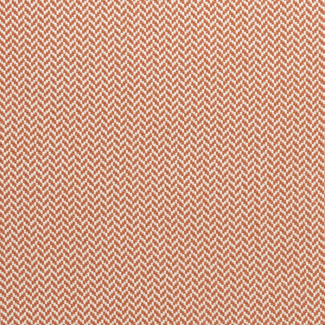 Close-up of warm cinnabar and cream zigzag woven upholstery fabric