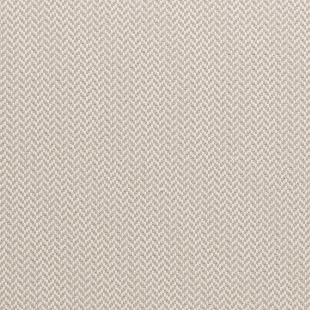 Close-up of natural beige fabric with fine cream herringbone weave