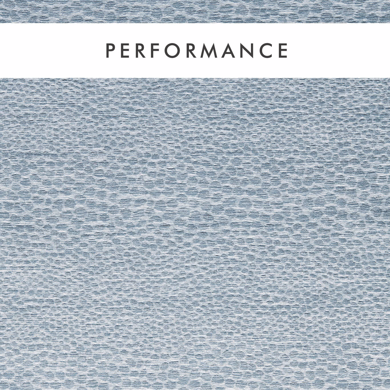 Close-up of pale mineral blue-grey fabric with small irregular woven pebble marks