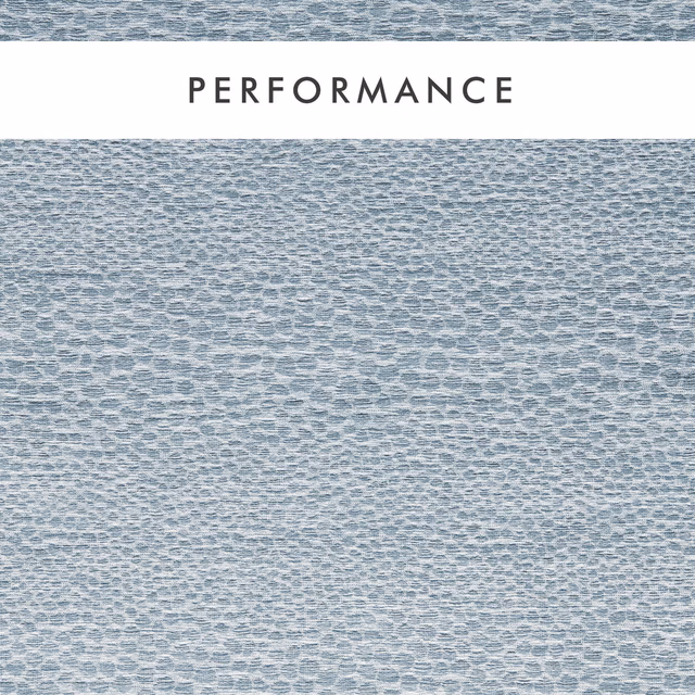 Close-up of pale mineral blue-grey fabric with small irregular woven pebble marks