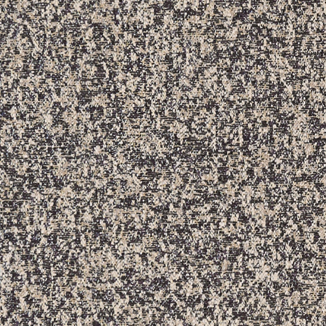 Close-up of midnight blue-black textile with cream and grey flecked woven texture