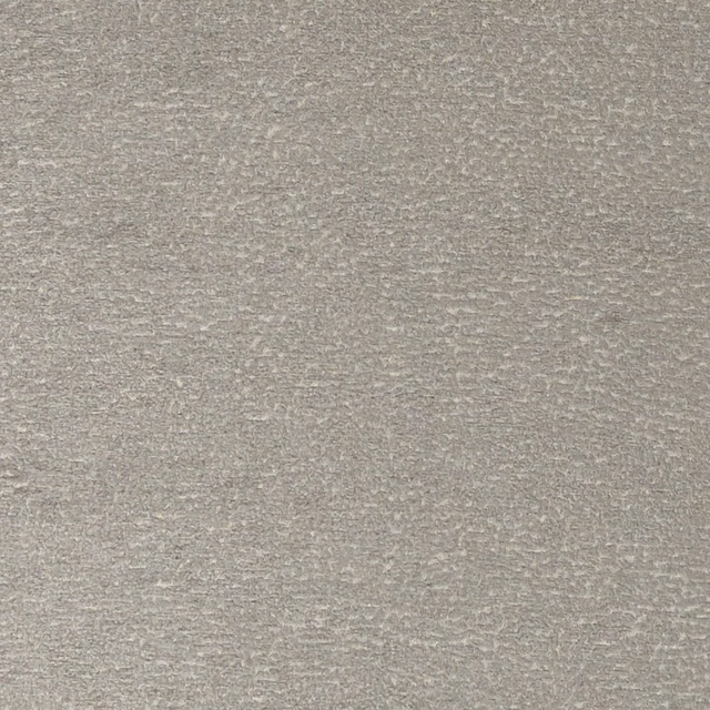Close-up of ash-grey textured textile with fine horizontal flecks and soft greige depth