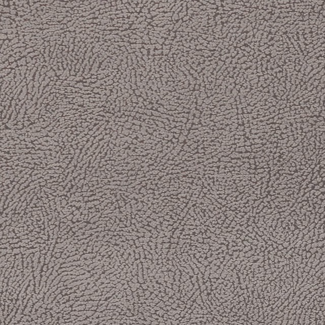 Close-up of cool dove-grey fabric with dense irregular dark-grey pebble-like texture