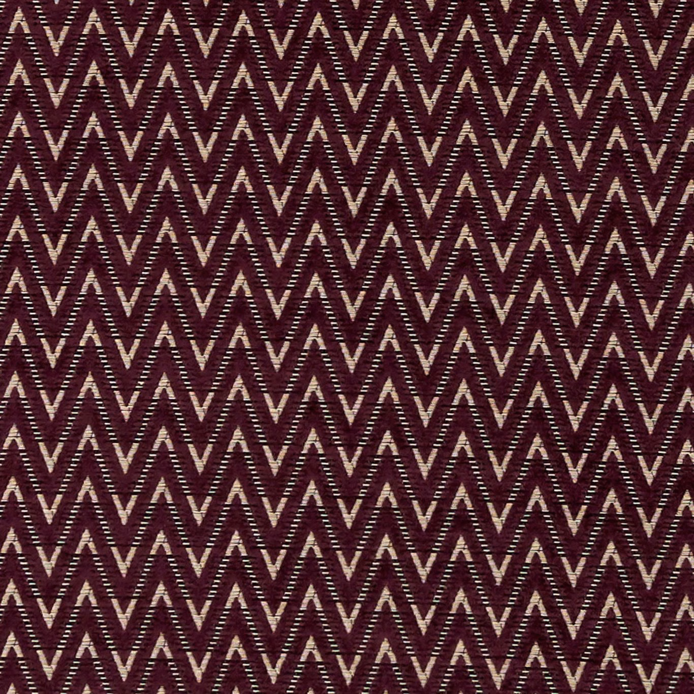 Deep damson woven chevrons with cream flecks and a compact zigzag repeat