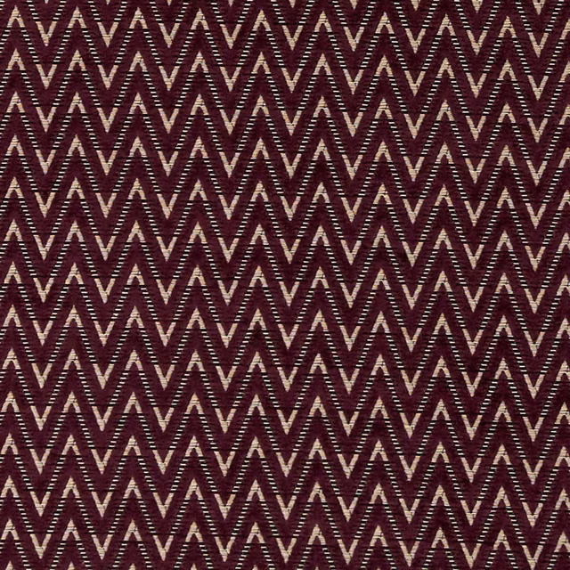 Deep damson woven chevrons with cream flecks and a compact zigzag repeat