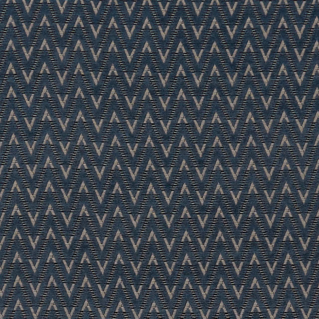 Muted denim-blue woven fabric with taupe chevron zigzags and fine ribbed texture