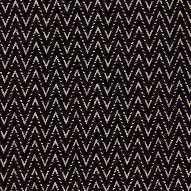 Black woven fabric with tightly spaced ivory-grey chevron zigzags and tactile texture
