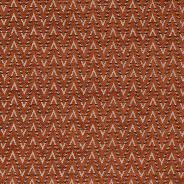 Rust terracotta woven upholstery with taupe zigzag chevrons and fine textured detailing