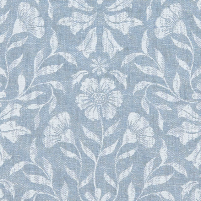 Soft denim-blue woven ground with ivory trailing flowers, leaves and fine stems