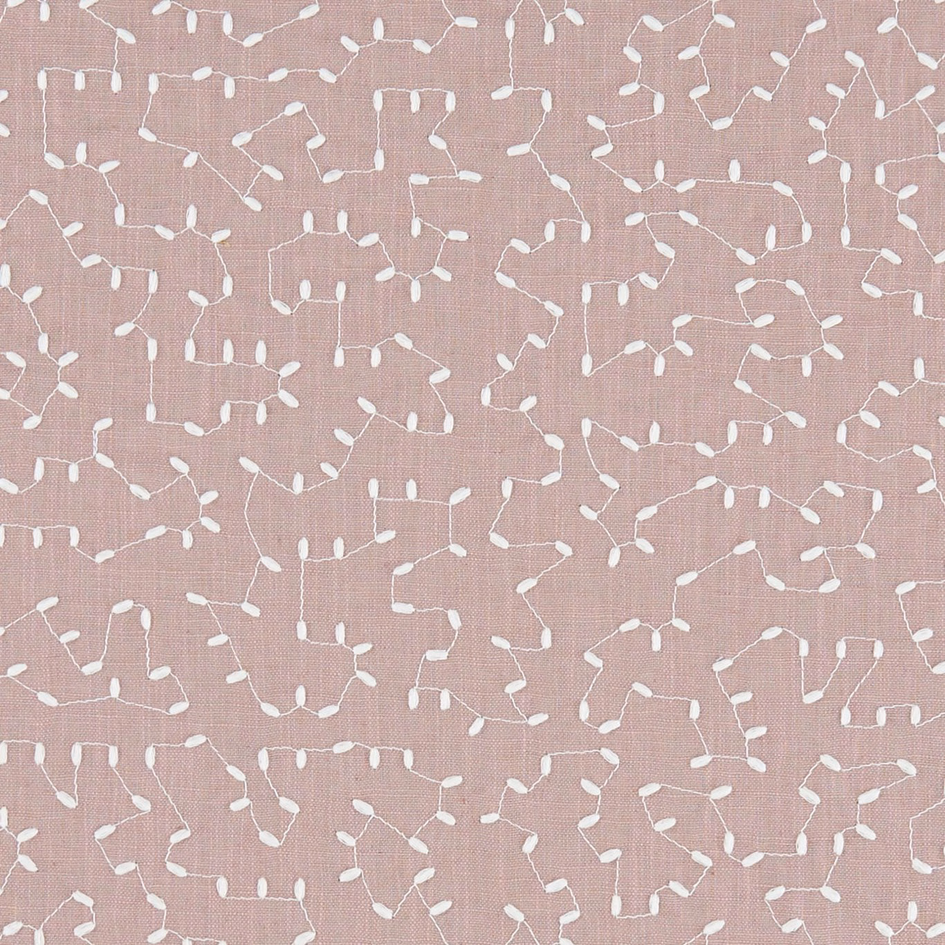 Muted dusty pink woven swatch with scattered white looping linear motifs