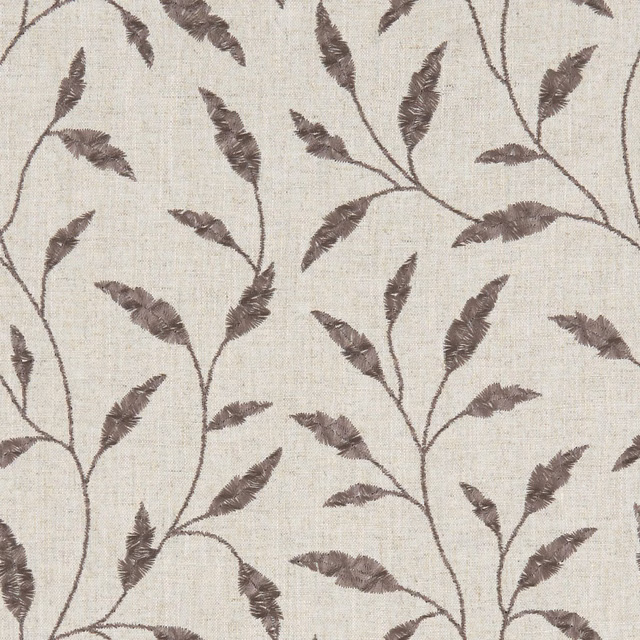 Warm ivory woven ground with charcoal feathered leaves and branching vines
