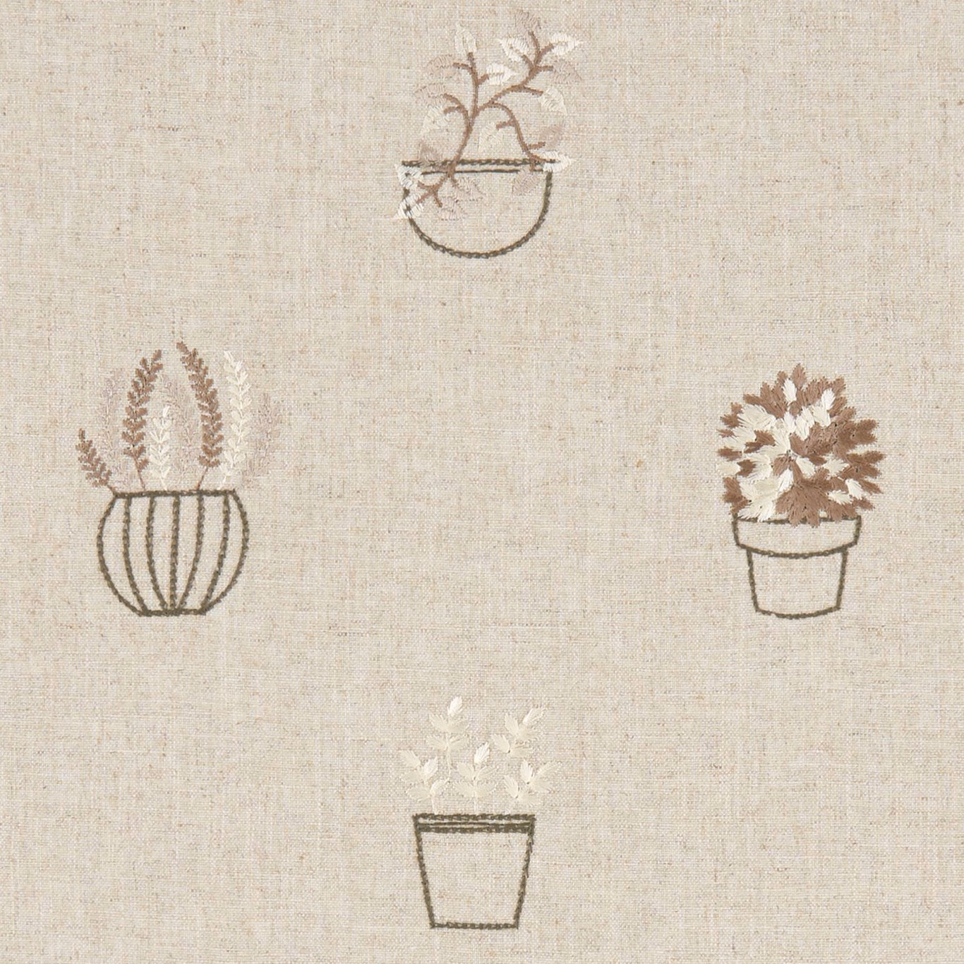 Warm oatmeal woven fabric with muted brown potted botanical motifs