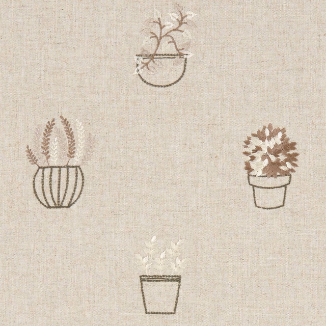 Warm oatmeal woven fabric with muted brown potted botanical motifs