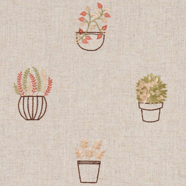 Warm oat textile with small terracotta, sage and blush potted botanicals