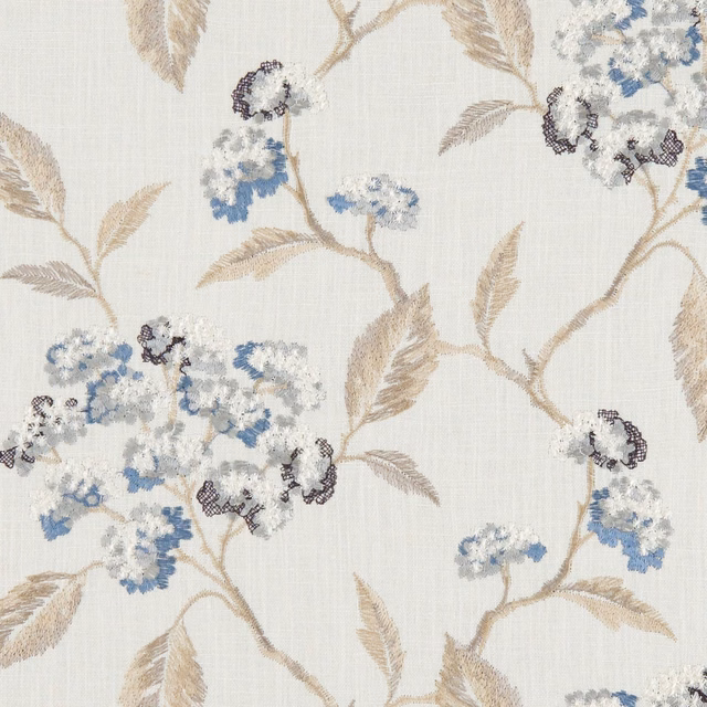 Pale denim-blue floral clusters with taupe branches on a finely textured light ground