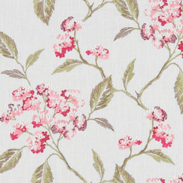 Pale woven fabric with raspberry blossom clusters and olive-green branching stems