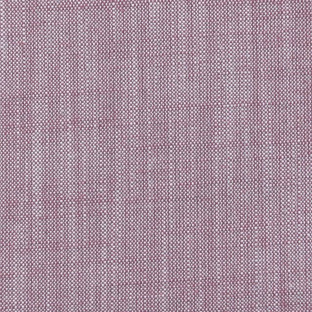 Close-up of muted heather-mauve cloth showing a dense, subtly flecked woven texture