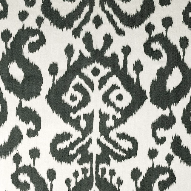 Charcoal-black and ivory woven damask with symmetrical scroll and floral motifs