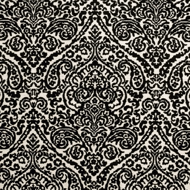 Dense black damask scrolls woven across a warm white textured ground