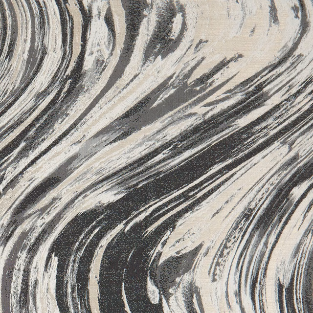 Charcoal and warm gold abstract sweeps over a cream striated textile