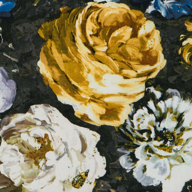 Painterly ochre rose and ivory blooms against a deep charcoal floral ground