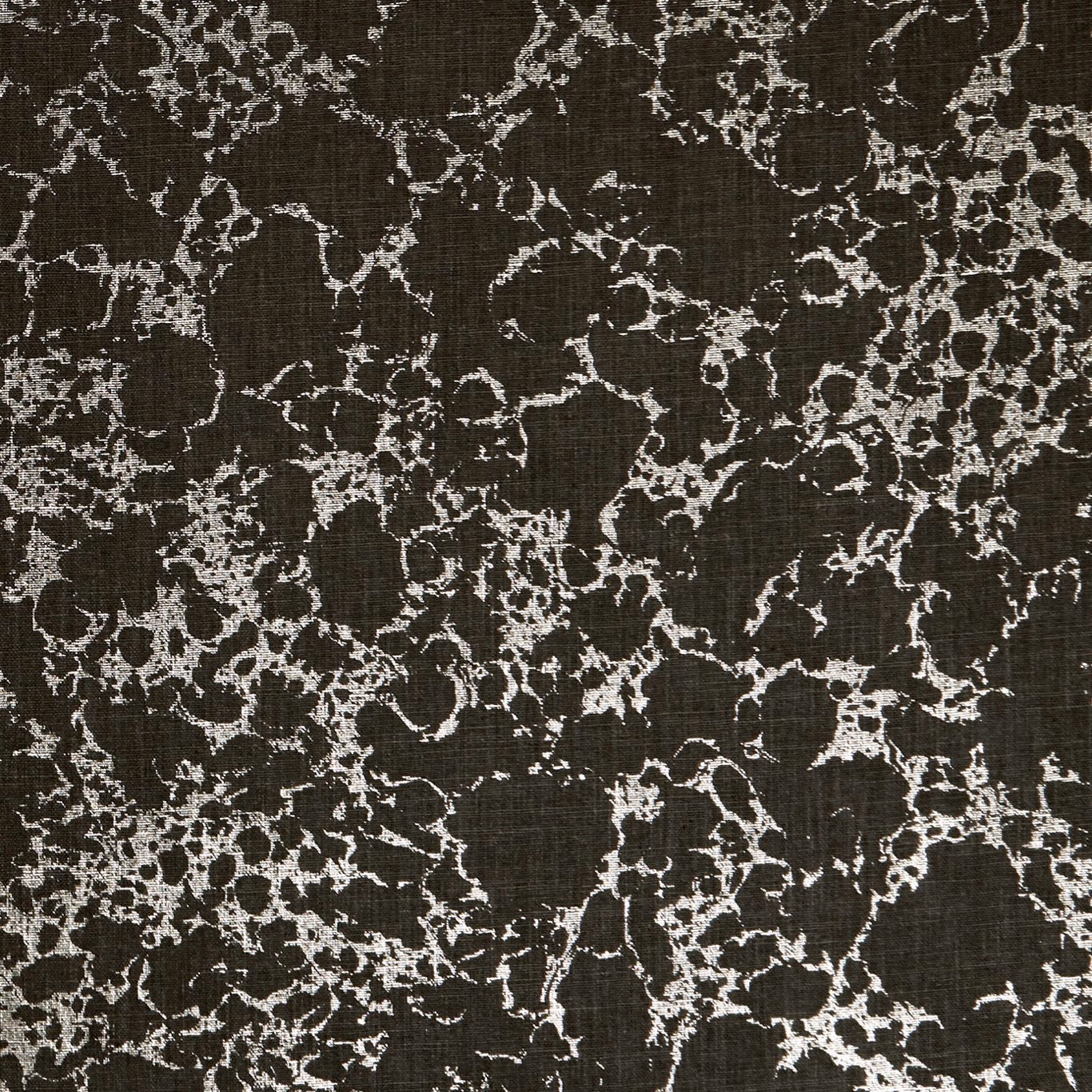 Charcoal woven ground with pale gold branching botanical tracery
