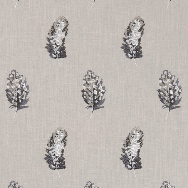 Charcoal botanical sprigs with ivory highlights on a textured linen-grey woven ground