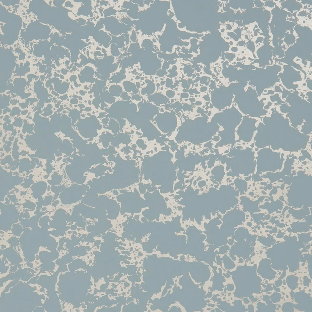 Cool mineral-blue wallpaper with pale gold, irregular stone-like marbling