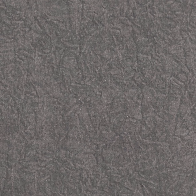 Smoky charcoal-grey fabric with fine irregular crinkled lines and a softly raised weave