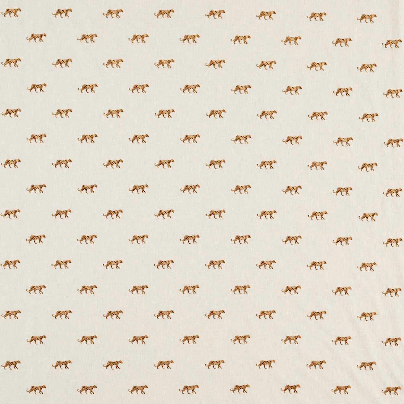 Warm ivory fabric with evenly spaced small ochre-brown tiger motifs