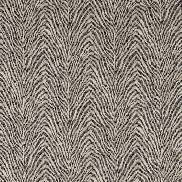 Charcoal branching zebra stripes woven across a natural linen textured ground