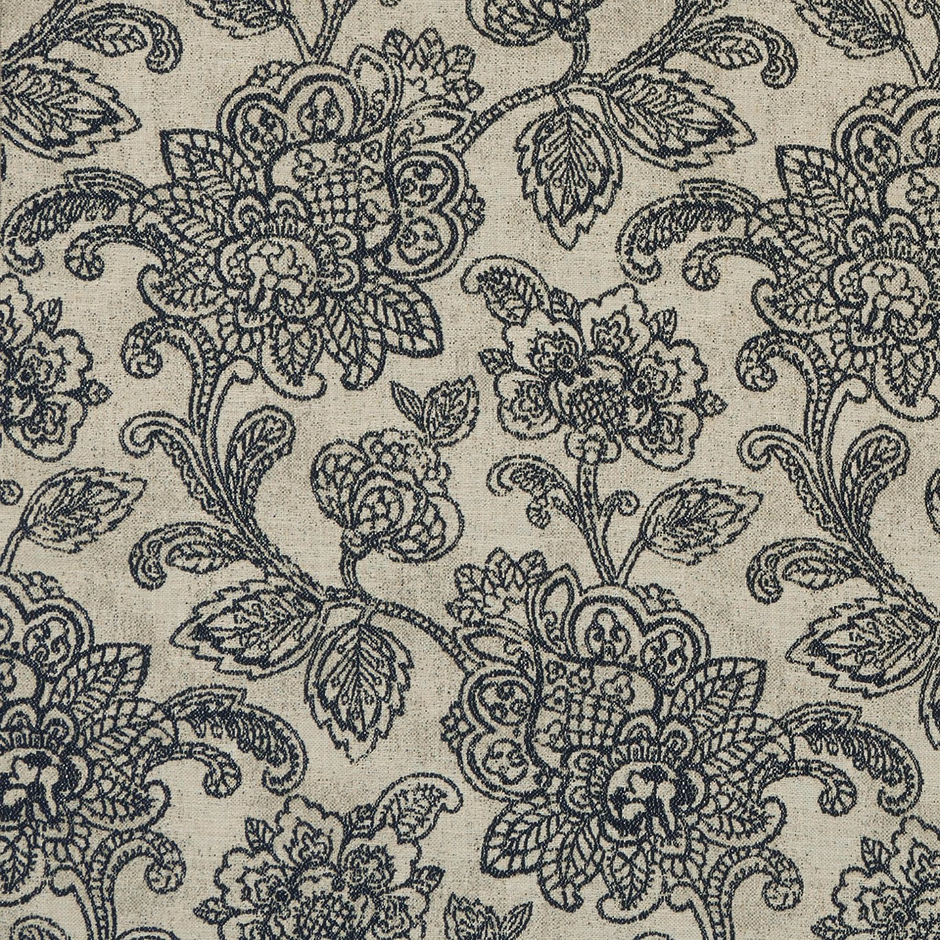 Charcoal floral paisley vines woven over a warm stone fabric ground
