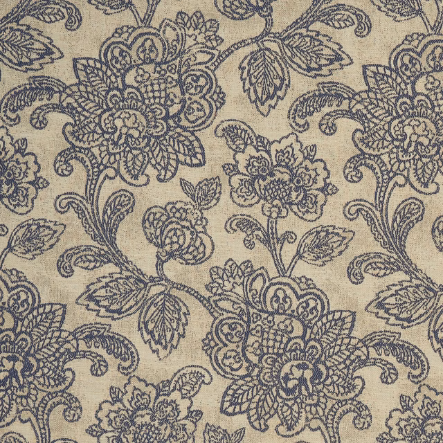 Midnight-blue floral and paisley motifs on a warm taupe woven ground